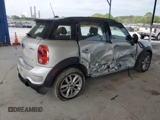 2014 MINI Countryman S with VIN WMWZC3C56EWP29211, listed as a Copart auction lot 52521145 with 91,396 mi miles and Salvage title. Bid and sale history available at DreamBid. Image 3.