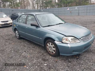 2000 Honda Civic VP with VIN 2HGEJ6613YH502032, listed as a IAAI auction lot 41940999 with 236,396 mi miles. Bid and sale history available at carsss.com. Image 1.
