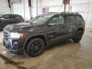 2020 GMC Acadia AT4 with VIN 1GKKNLLS4LZ165918, listed as a Copart auction lot 58094985 with 75,569 mi miles and Salvage title. Bid and sale history available at DreamBid. Image 1.