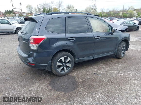 2018 Subaru Forester Premium with VIN JF2SJAEC7JH574341, listed as a IAAI auction lot 42021599 with 58,000 mi miles and . Bid and sale history available at DreamBid. Image 4.