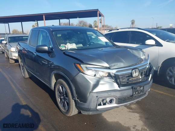 2017 Honda Ridgeline RTL-E with VIN 5FPYK3F77HB012606, listed as a IAAI auction lot 41409677 with 93,943 mi miles. Bid and sale history available at carsss.com. Image 1.
