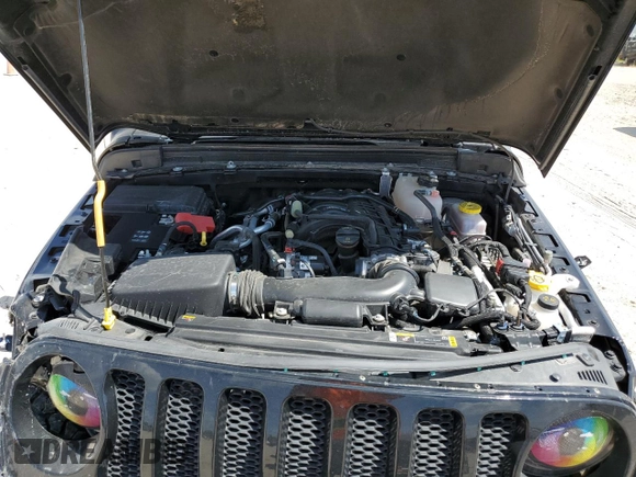 2023 Jeep Wrangler Sport with VIN 1C4HJXAG3PW672856, listed as a Copart auction lot 70444274 with 6,077 mi miles and Salvage title. Bid and sale history available at DreamBid. Image 12.