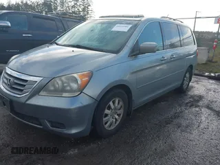 2010 Honda Odyssey EX-L with VIN 5FNRL3H70AB027137, listed as a IAAI auction lot 41659981 with 202,256 mi miles and . Bid and sale history available at DreamBid. Image 2.