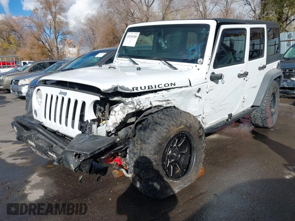 2014 Jeep Wrangler Unlimited Rubicon with VIN 1C4BJWFG2EL264792, listed as a IAAI auction lot 40938380 with 145,886 mi miles. Bid and sale history available at carsss.com. Image 20.