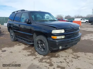 2001 Chevrolet Tahoe LS with VIN 1GNEK13T41R219642, listed as a IAAI auction lot 41655081 with 243,737 mi miles. Bid and sale history available at carsss.com. Image 1.