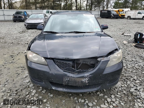 2006 Mazda 3 i Touring with VIN JM1BK32G761490132, listed as a Copart auction lot 52937645 with 146,299 mi miles and Salvage Title. Bid and sale history available at DreamBid. Image 5.