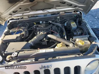 2009 Jeep Wrangler Unlimited X with VIN 1J4GA39179L756228, listed as a Copart auction lot 50086445 with 158,274 mi miles and Salvage Title. Bid and sale history available at carsss.com. Image 11.
