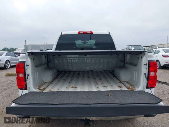 2018 Chevrolet Silverado 1500 LT with VIN 3GCPCREC7JG402401, listed as a IAAI auction lot 41880462 with 128,995 mi miles and . Bid and sale history available at DreamBid. Image 17.