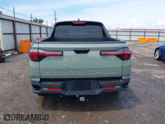 2022 Hyundai Santa Cruz SEL with VIN 5NTJB4AEXNH034989, listed as a IAAI auction lot 42176050 with 27,297 mi miles and . Bid and sale history available at DreamBid. Image 17.