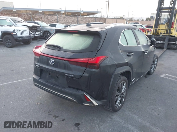 2021 Lexus UX with VIN JTHE9JBH5M2054228, listed as a IAAI auction lot 41651686 with 35,955 mi miles. Bid and sale history available at carsss.com. Image 4.