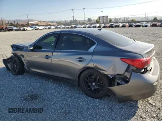 2014 Infiniti Q50 Premium with VIN JN1BV7AP3EM690697, listed as a Copart auction lot 87107684 with 82,862 mi miles and Salvage Title. Bid and sale history available at carsss.com. Image 2.