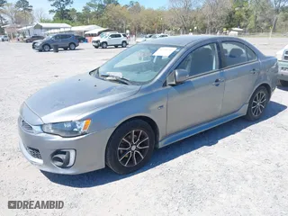 2017 Mitsubishi Lancer ES with VIN JA32U2FU1HU007318, listed as a IAAI auction lot 41908084 with 159564 miles. Bid and sale history available at carsss.com. Image 17.