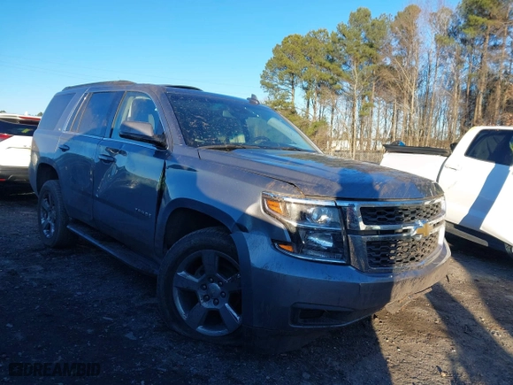 2019 Chevrolet Tahoe LT with VIN 1GNSCBKC8KR123828, listed as a IAAI auction lot 41256573 with 125,618 mi miles. Bid and sale history available at carsss.com. Image 1.