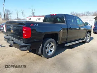 2018 Chevrolet Silverado 1500 LT with VIN 1GCUKREC3JF119906, listed as a IAAI auction lot 41765398 with 122,472 mi miles and . Bid and sale history available at DreamBid. Image 4.