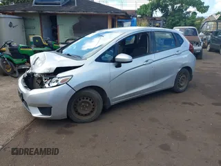 2015 Honda Fit LX with VIN 3HGGK5H58FM727710, listed as a IAAI auction lot 42208290 with 121,552 mi miles. Bid and sale history available at carsss.com. Image 2.