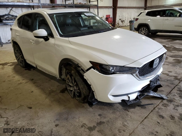 2018 Mazda CX-5 Touring with VIN JM3KFBCM9J0469890, listed as a Copart auction lot 45532505 with 58,208 mi miles and Salvage Title. Bid and sale history available at carsss.com. Image 4.