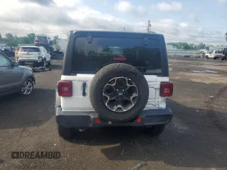 2021 Jeep Wrangler 80th Anniversary with VIN 1C4GJXAN9MW726831, listed as a Copart auction lot 55909084 with 23,602 mi miles and Salvage Title. Bid and sale history available at DreamBid. Image 6.