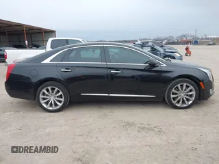 2017 Cadillac XTS Luxury with VIN 2G61M5S39H9166549, listed as a IAAI auction lot 41593859 with 164,557 mi miles. Bid and sale history available at carsss.com. Image 14.