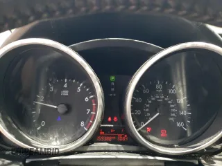 2015 Mazda 5 Touring z VIN JM1CW2CL4F0188463, wystawiony jako Copart lot #57597535 z przebiegiem 159 388 mil mil oraz Szkoda całkowita • Salvage title. Historia ofert i sprzedaży dostępna na DreamBid. Obrazek 9.