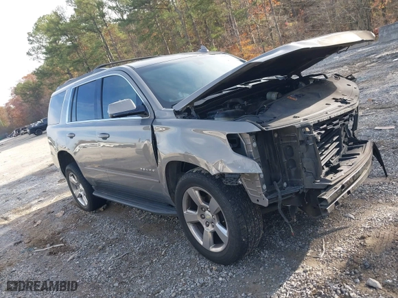2017 Chevrolet Tahoe LS with VIN 1GNSCAKC7HR179715, listed as a IAAI auction lot 40948996 with 164,178 mi miles. Bid and sale history available at carsss.com. Image 1.