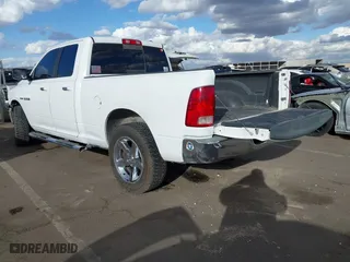 2010 Dodge Ram 1500 SLT with VIN 1D7RB1GT3AS141602, listed as a IAAI auction lot 41593437 with 252,154 mi miles. Bid and sale history available at carsss.com. Image 3.