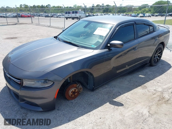 2015 Dodge Charger SE z VIN 2C3CDXBGXFH751491, wystawiony jako IAAI lot #41907243 z przebiegiem 112 545 mil mil oraz . Historia ofert i sprzedaży dostępna na DreamBid. Obrazek 17.