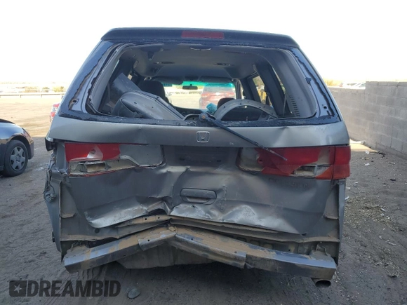 2000 Honda Odyssey EX with VIN 2HKRL1861YH527864, listed as a Copart auction lot 51343745 with 262,483 mi miles and Salvage Title. Bid and sale history available at DreamBid. Image 6.