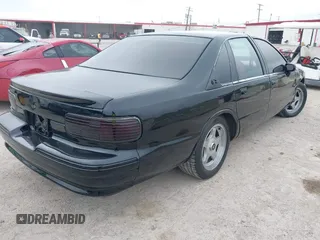 1994 Chevrolet Caprice LS z VIN 1G1BN52PXRR153486, wystawiony jako IAAI lot #42385035 z przebiegiem Nie podano mil oraz . Historia ofert i sprzedaży dostępna na DreamBid. Obrazek 4.
