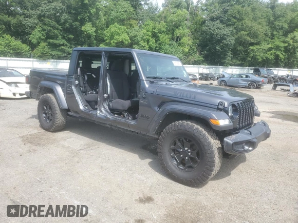 2021 Jeep Gladiator Willys with VIN 1C6HJTAG7ML572661, listed as a Copart auction lot 61172665 with 54,317 mi miles and Salvage title. Bid and sale history available at DreamBid. Image 4.