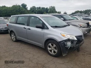 2015 Toyota Sienna L with VIN 5TDZK3DCXFS620092, listed as a Copart auction lot 61606095 with 130,624 mi miles and Salvage title. Bid and sale history available at DreamBid. Image 4.