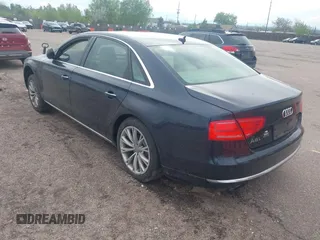 2011 Audi A8 z VIN WAURVAFD3BN019461, wystawiony jako IAAI lot #42211319 z przebiegiem 151 936 mil mil oraz . Historia ofert i sprzedaży dostępna na DreamBid. Obrazek 3.