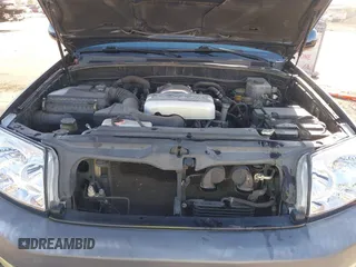 2003 Toyota 4Runner SR5 with VIN JTEZT14R238001097, listed as a IAAI auction lot 41266011 with 180,905 mi miles. Bid and sale history available at carsss.com. Image 10.