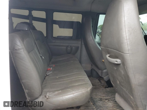 2014 Chevrolet Express Passenger 1LS with VIN 1GAZGZFAXE1105162, listed as a Copart auction lot 72773154 with 97,950 mi miles and Salvage title. Bid and sale history available at DreamBid. Image 11.