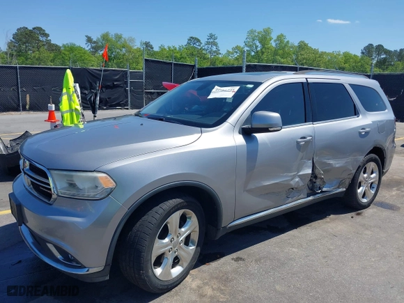 2014 Dodge Durango Limited with VIN 1C4RDHDG0EC281689, listed as a IAAI auction lot 41981255 with 153,772 mi miles. Bid and sale history available at carsss.com. Image 2.