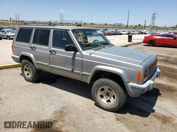 2000 Jeep Cherokee with VIN 1J4FF48S6YL136689, listed as a Copart auction lot 62316245 with 211,100 mi miles and Clean title. Bid and sale history available at DreamBid. Image 4.
