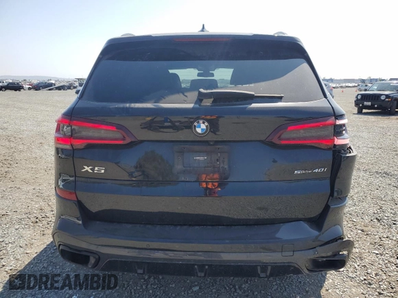 2021 BMW X5 sDrive40i with VIN 5UXCR4C00M9F54602, listed as a Copart auction lot 62417255 with 42,110 mi miles and Salvage title. Bid and sale history available at DreamBid. Image 6.
