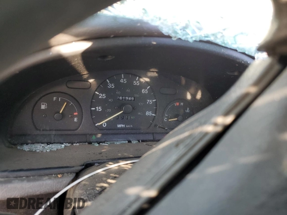 1999 Suzuki Swift z VIN 2S2AB21H7X6601864, wystawiony jako Copart lot #72661164 z przebiegiem 261 948 mil mil oraz Szkoda całkowita • Salvage title. Historia ofert i sprzedaży dostępna na DreamBid. Obrazek 9.