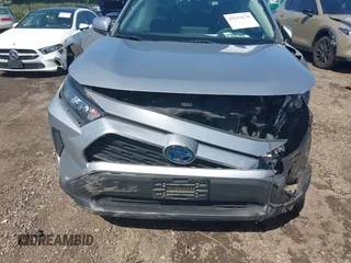 2019 Toyota RAV4 Hybrid LE with VIN 2T3MWRFVXKW031519, listed as a IAAI auction lot 42531170 with 68,160 mi miles and . Bid and sale history available at DreamBid. Image 12.