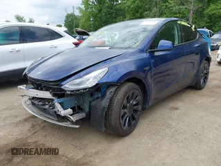 2024 Tesla Model Y Long Range z VIN 7SAYGDEE4RA247532, wystawiony jako IAAI lot #42205480 z przebiegiem 21 273 mil mil oraz . Historia ofert i sprzedaży dostępna na DreamBid. Obrazek 2.