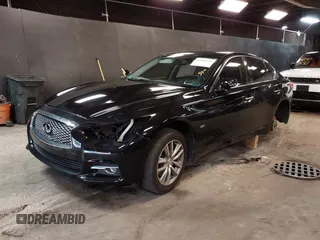 2017 Infiniti Q50 Premium z VIN JN1EV7AR7HM834870, wystawiony jako IAAI lot #42381151 z przebiegiem 89 438 mil mil oraz . Historia ofert i sprzedaży dostępna na DreamBid. Obrazek 18.