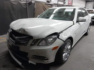 2012 Mercedes-Benz E-Class E 350 Luxury with VIN WDDHF5KB9CA548550, listed as a IAAI auction lot 41626757 with 125,402 mi miles. Bid and sale history available at carsss.com. Image 2.