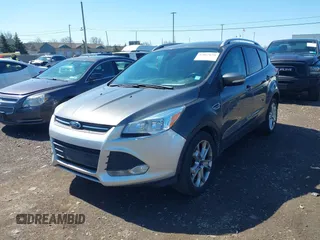 2014 Ford Escape Titanium with VIN 1FMCU9JX1EUB94776, listed as a IAAI auction lot 42063678 with 138,036 mi miles. Bid and sale history available at carsss.com. Image 6.