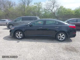 2014 Kia Optima LX with VIN 5XXGM4A72EG343520, listed as a IAAI auction lot 42050562 with 126,270 mi miles. Bid and sale history available at carsss.com. Image 14.
