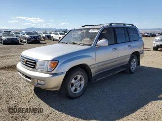 1999 Toyota Land Cruiser z VIN JT3HT05JXX0069773, wystawiony jako Copart lot #55340415 z przebiegiem 171 384 mil mil oraz Czysty tytuł • Clean title. Historia ofert i sprzedaży dostępna na DreamBid. Obrazek 1.