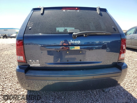 2010 Jeep Grand Cherokee Laredo with VIN 1J4PR4GK9AC104970, listed as a Copart auction lot 72173034 with 120,354 mi miles and Salvage Title. Bid and sale history available at carsss.com. Image 6.