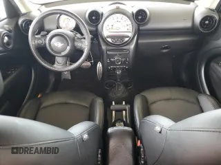 2014 MINI Countryman S with VIN WMWZC3C56EWP29211, listed as a Copart auction lot 52521145 with 91,396 mi miles and Salvage title. Bid and sale history available at DreamBid. Image 8.