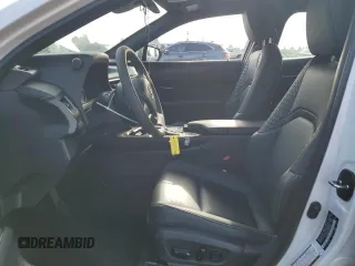 2022 Lexus UX 250h with VIN JTHX9JBH2N2056285, listed as a Copart auction lot 87221214 with 33,377 mi miles and Salvage title. Bid and sale history available at DreamBid. Image 7.