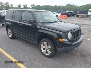 2014 Jeep Patriot Latitude with VIN 1C4NJRFB7ED713462, listed as a IAAI auction lot 42036671 with 116,276 mi miles. Bid and sale history available at carsss.com. Image 1.