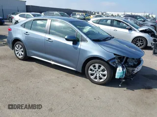 2024 Toyota Corolla Hybrid LE with VIN JTDBCMFE3R3056892, listed as a IAAI auction lot 41848407 with 42,511 mi miles. Bid and sale history available at carsss.com. Image 1.