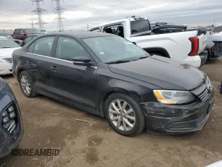 2013 Volkswagen Jetta SE with VIN 3VWDX7AJ9DM376872, listed as a Copart auction lot 50991535 with 138,466 mi miles and Salvage title. Bid and sale history available at DreamBid. Image 4.